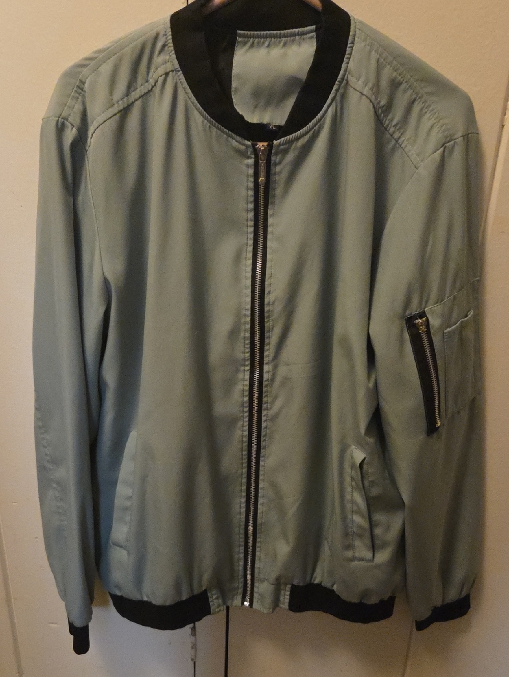 Vogue Light Sage Green Bomber Jacket with Black Trim